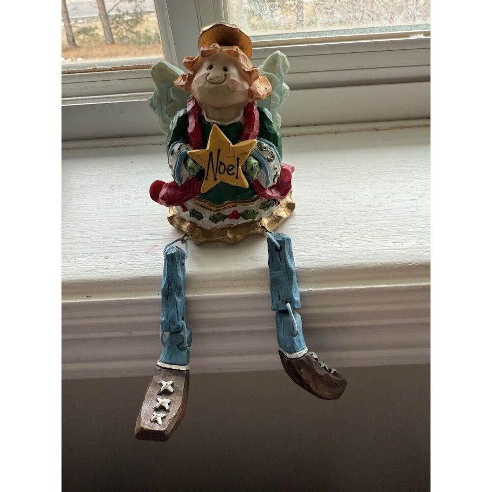 Christmas Angle Sitting On Shelf